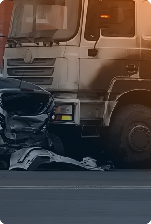Close-up of a damaged car crushed by a commercial truck on a Connecticut road, showing the aftermath of a serious truck crash