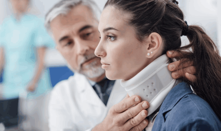 Young woman wearing a neck brace being examined by a doctor, representing neck injury legal cases in Hartford and across Connecticut.