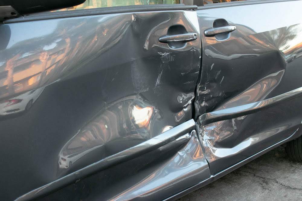 Injuries Reported in 2-Vehicle Crash on West St